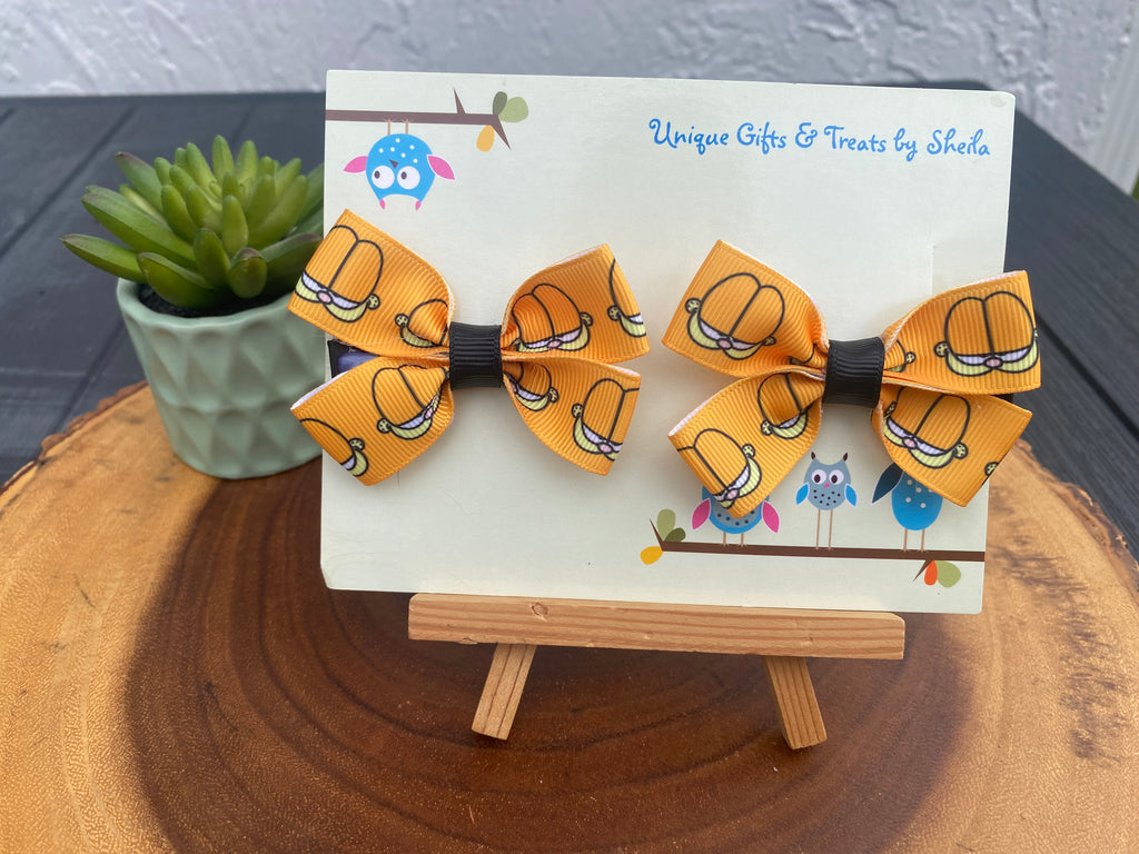 1980’s Orange Lasagna Eating Cat Hairbows