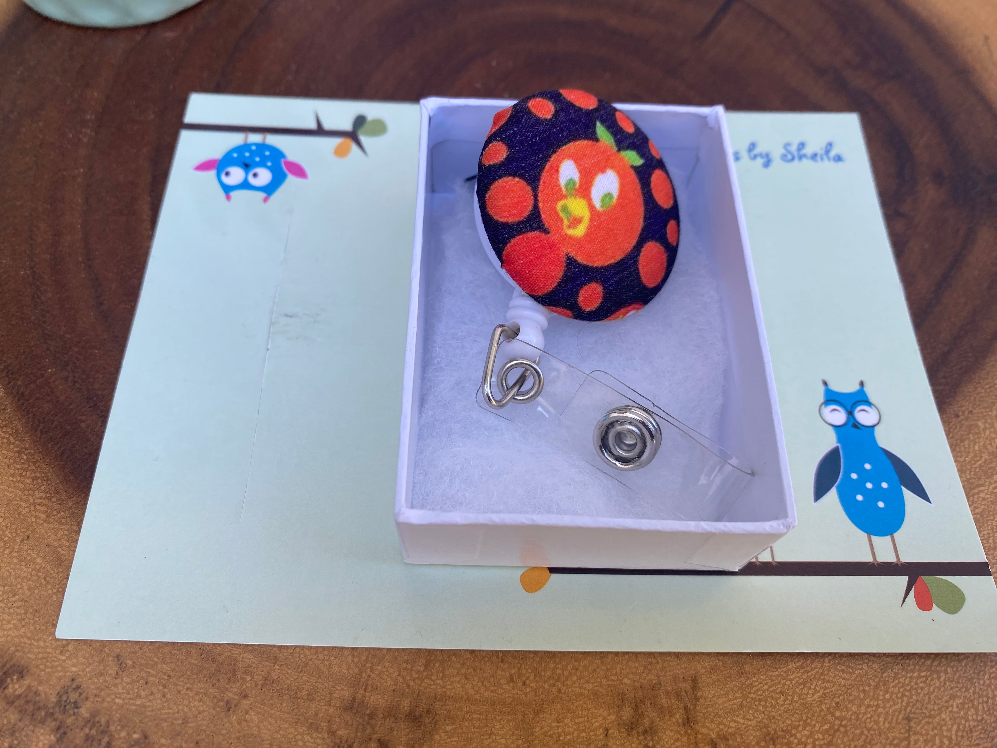 Orange Bird Badge Reel